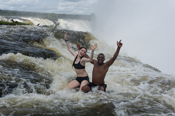 Sitting at the edge of Victoria Falls